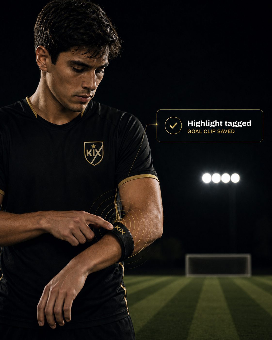 A player in a black KIX kit pressing his KIX wristband to tag a highlight